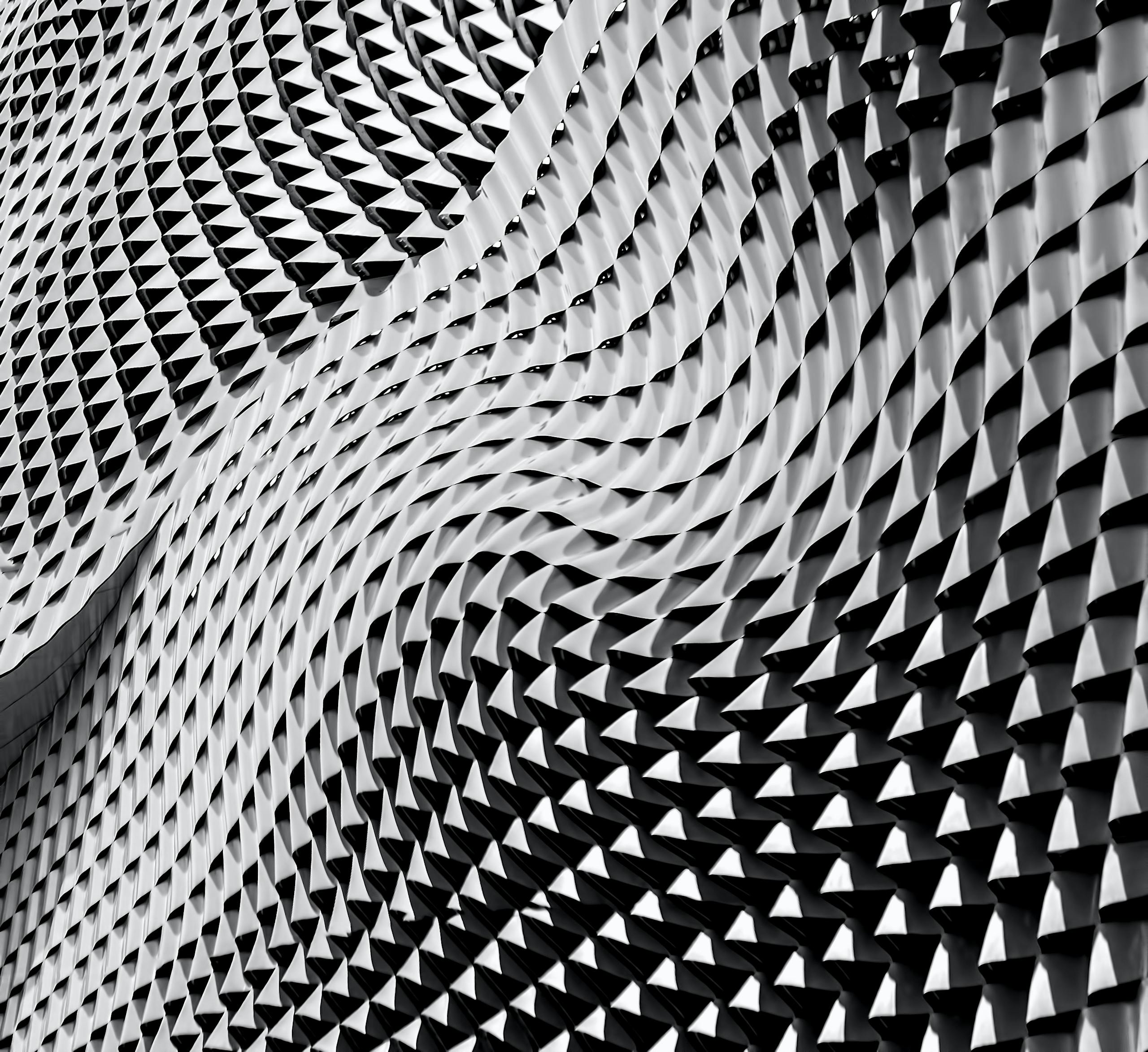 Wavy triangular architectural surface in black and white