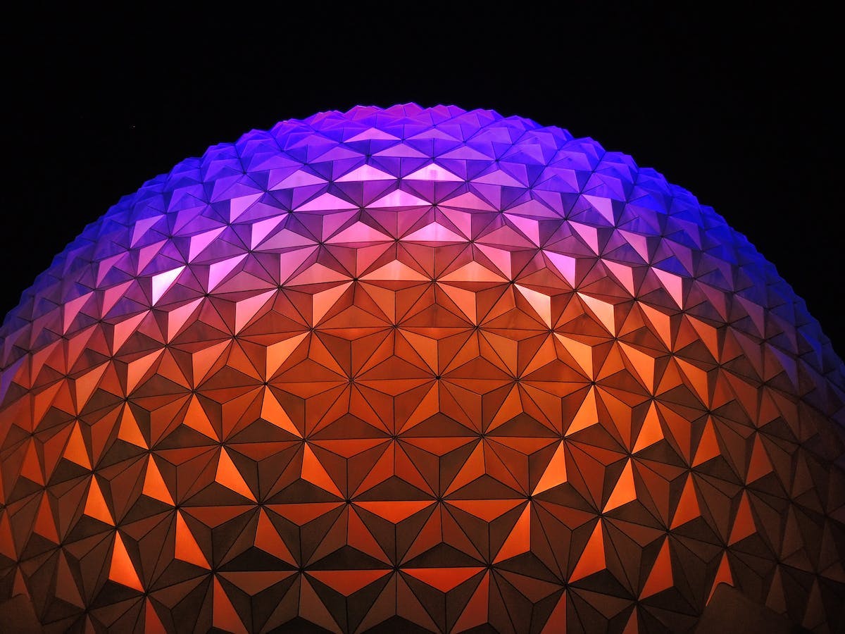 Multi-color sphere with triangular shapes on the surface